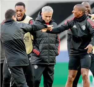  ?? AP ?? Manchester United manager Jose Mourinho (centre) watches his players during a training session on Tuesday ahead of the Champions League match against CSKA Moscow. —