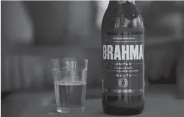  ?? ERALDO PERES/AP ?? An interfaith coalition is pressuring the world’s largest brewer to remove the name of the Hindu god, saying the name is offensive to Hindus, who worship Lord Brahma.