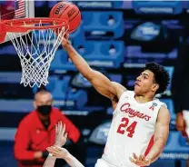  ?? Michael Hickey / Getty Images ?? Quentin Grimes and Houston could become the first team to advance to the Final Four without facing a single-digit seed.
