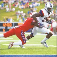  ?? Cooper Neill / Getty Images ?? UConn freshman receiver Keyion Dixon has 13 catches for 159 yards and one touchdown this season.