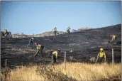  ?? Bobby Block/The Signal ?? Fire crews from multiple agencies work to battle a 30acre brush fire that broke out near Soledad Canyon Road in Canyon Country on Wednesday afternoon.