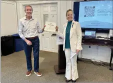  ?? COURTESY OF JEPTHA ABBOTT DAR ?? Martin McNeil, a volunteer ESL tutor with Volunteer English Program, received the DAR’s Literacy Champion Award from Jeptha Abbott DAR Regent Teri Fischer at the recent Jeptha Abbott Daughters of the American Revolution meeting in Radnor Township.