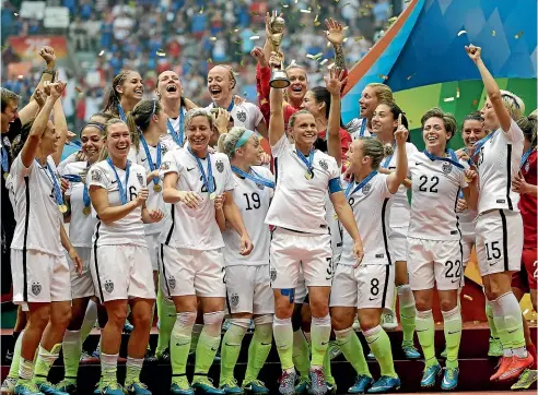  ?? AP ?? The United States celebrate winning the women’s World Cup in Canada in 2015.