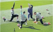  ?? AFP ?? Atletico Madrid players take part in a training session yesterday.