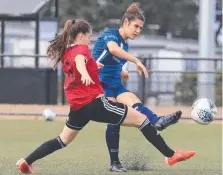  ??  ?? AWAY: Adriana Taranto under pressure from Box Hill’s Leia Varley.