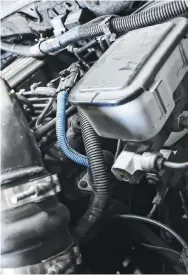  ??  ?? We could tell by the blue wiring cover that our factory shutoff solenoid had already been replaced at some point. Still, it was hit-and-miss on working, so it needed replaced.