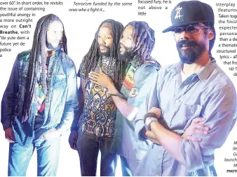  ?? PHOTO BY MARCIA ROWE ?? Kabaka Pyramid (second left) with his brother, Kevin Salmon (third left), the Marley clan – Julian (left) and Damian Jr Gong – at his album launch at the Bob Marley Museum last Friday.