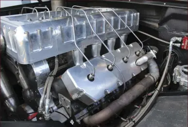  ??  ??  Surrounded by the one-off D&J Precision Machine billet-aluminum intake manifold, you’ll find an inline eight-cylinder P-pump from Northeast Diesel Service. The Bosch P7100 was treated to 13mm plungers and barrels, is capable of flowing 950cc of fuel...