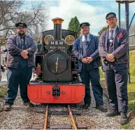 ?? OLIVER RIDGE/LVR ?? During a minute’s silence observed at Cornwall’s Lappa Valley Railway, operations manager Ben Harding and drivers Ben Patrick and Lee Moseley stand in front of 0-4-2T Ellie.