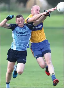  ??  ?? Robbie Cluske y of St Colmcille ’s and Damie n She ridan jnr of Se ne schalstown in action on Sunday.