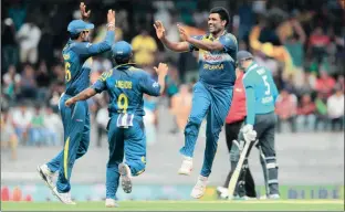  ?? Picture: AP PHOTO/ ERANGA JAYAWARDEN­A ?? GONE: Sri Lankan bowler Thisara Perera celebrates taking the wicket of England’s Eoin Morgan during the second one-day internatio­nal in Colombo, Sri Lanka, yesterday.