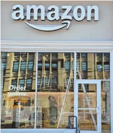 ?? STAFF FILE PHOTO BY CHRIS CHRISTO ?? STAKING ITS FLAG: Amazon already has a presence in Boston with its recently opened pickup location at 870 Commonweal­th Ave.