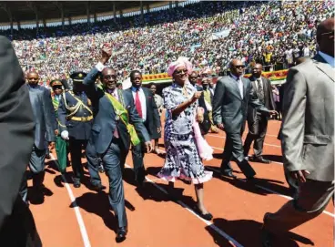  ??  ?? President Robert Mugabe of Zimbabwe and his wife, Grace, celebrated Zimbabwe’s Independen­ce Day in 2012 in Harare, the capital. On Wednesday, the military placed Mr. Mugabe under house arrest. Credit Lynsey Addario for The New York Times