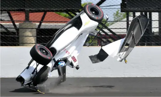  ?? Associated Press ?? The car driven by Kyle Kaiser goes airborne after hitting the wall along the third turn during practice for the Indianapol­is 500 Friday.