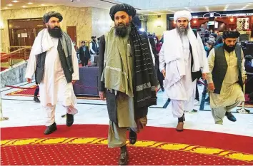  ?? Reuters ?? Mullah Abdul Ghani Baradar, centre, the Taliban co-founder, will lead a new Afghan government.