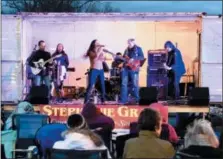  ?? JeSi YoSt — for Digital firSt MeDia ?? rising country/pop music star Stephanie grace belts out a tune at amity Winterfest.