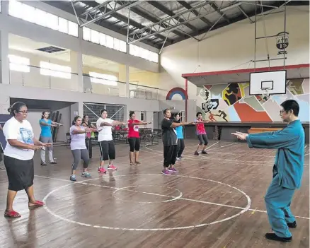  ?? Photo: Xinhua ?? Sun Jie instructin­g the teachers of Marist Brothers High School on Chinese Tai Chi in Suva, on September 2, 2020.