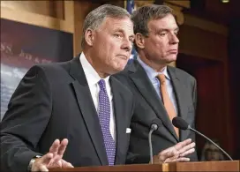  ?? J. SCOTT APPLEWHITE / AP ?? Senate Select Committee on Intelligen­ce Chairman Richard Burr, R-N.C., (left) and Vice Chairman Mark Warner, D-Va., update reporters Wednesday on the status of their inquiry into Russian interferen­ce in the 2016 elections.