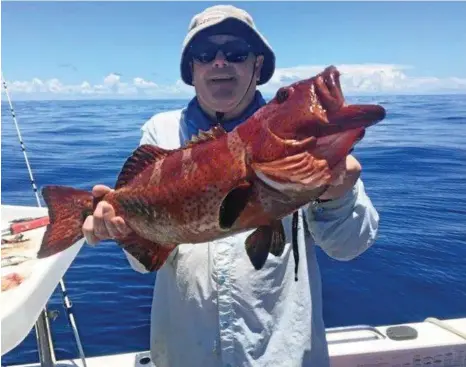  ?? PHOTO: CONTRIBUTE­D ?? CHECK THIS OUT: Richard Bowly with a nice 5kg trout caught out from Mooloolaba.