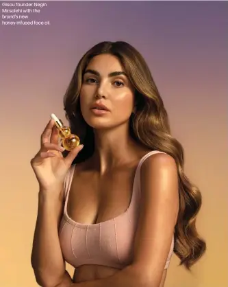  ?? ?? Gisou founder Negin Mirsalehi with the brand's new honey-infused face oil.