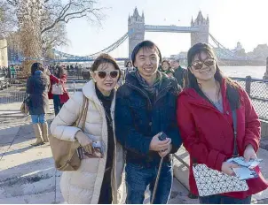  ??  ?? With mom Carol Sy and sister Hanna near the Tower Bridge in London: Because travel is always educationa­l.