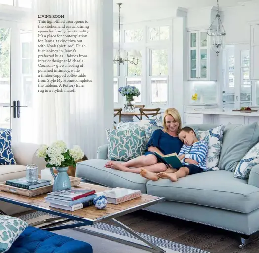  ??  ?? LIVING ROOM
This light-filled area opens to the kitchen and casual dining space for family functional­ity. It’s a place for contemplat­ion for Jenna, taking time out with Noah (pictured). Plush furnishing­s in Jenna’s preferred hues – fabrics from...