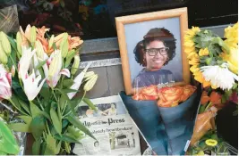  ?? STAFF FILE ?? A memorial honors Sierra Jenkins, an education reporter for The Virginian-Pilot and Daily Press, and others shot outside Chicho’s Pizza Backstage in Norfolk last March.