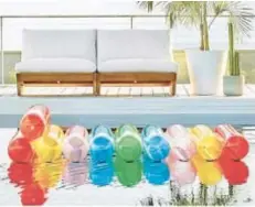  ??  ?? You’ll feel like you’re floating on cloud nine when you recline on the Love One Another Pool Party Float from Fred Segal’s CB2 outdoor collection. $80, cb2.com