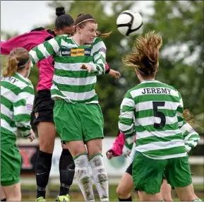  ??  ?? Current Republic of Ireland internatio­nal Rianna Jarrett wins this heading duel with Aileen Gilroy (Castlebar Celtic) to score a goal for Wexford Youths Women in their National League Cup final clash in Ferrycarri­g Park on May 18, 2014.