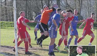  ?? Match report and photograph­s Derek Black ?? Kyle Cooper’s header is blocked.