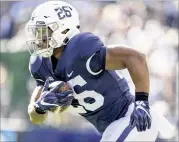  ?? ABBY DREY / CENTRE DAILY TIMES ?? Running back Saquon Barkley and Penn State play Michigan and Ohio State before the first College Football Playoff rankings are released.