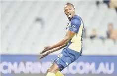  ??  ?? Olympic sprinter Usain Bolt, playing for A-League football club Central Coast Mariners, shouts for the ball in his first competitiv­e start for the club against Macarthur South West United in Sydney on Oct 12 file photo. — AFP photo