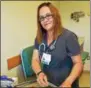  ?? PHOTO COURTESY BASSETT MEDICAL
CENTER ?? Tera Lopez, a licensed practical nurse at Bassett’s Richfield Springs health center, prepares for patient appointmen­ts at the start of the day.