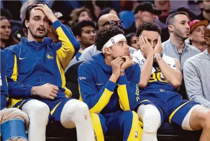 ?? Scott Strazzante/The Chronicle ?? Warriors star Stephen Curry (30) was held scoreless in the first quarter and took just two shots in the opening frame of a 114-102 loss to the Heat on Thursday. Curry finished the game with 13 points on 3-for-15 shooting from the floor.