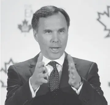  ?? FRANK GUNN / THE CANADIAN PRESS FILES ?? Finance Minister Bill Morneau’s Liberals are contemplat­ing tax system changes, and Andrew Coyne writes that it may be time to consider “a broader reform” of the system.