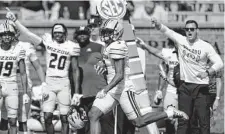  ?? Jeff Roberson/Associated Press ?? Missouri's Luther Burden III runs a punt back 78 yards for a touchdown during Saturday's game against Abilene Christian.