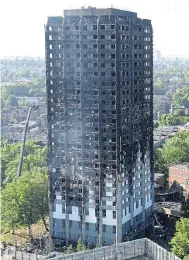  ??  ?? TRAGEDY: Burnt-out Grenfell Tower in London