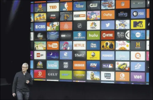  ?? MARCIO JOSE SANCHEZ/THE ASSOCIATED PRESS ?? Apple CEO Tim Cook speaks about Apple TV during an announceme­nt of new products in October in Cupertino, Calif.