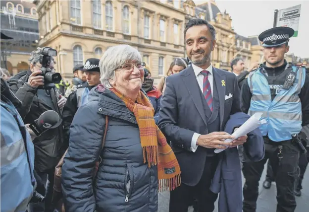  ??  ?? 0 Clara Ponsati outside Edinburgh Sheriff Court with Aamer Anwar, who said the European Arrest Warrant was an abuse of the extraditio­n process