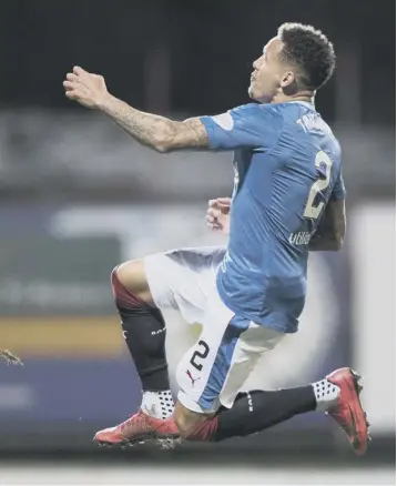  ??  ?? 0 Rangers’ James Tavernier leaps in the air to celebrate his goal against Partick Thistle last night.