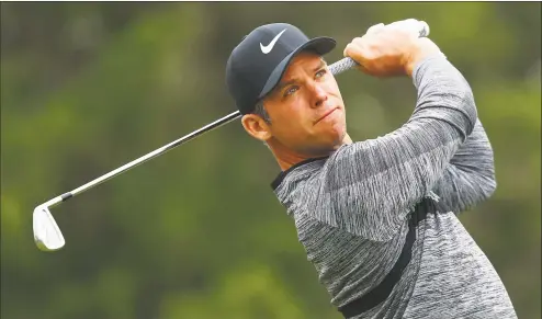  ?? Tim Bradbury / Getty Images ?? Paul Casey plays his shot from the fifth tee during the third round of the Travelers Championsh­ip on Saturday.