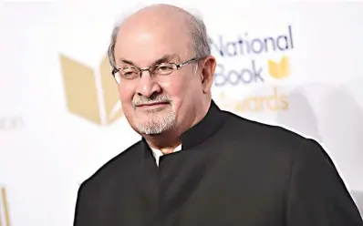  ?? Photo by Evan Agostini/Invision/AP, File ?? ■ Salman Rushdie attends the 68th National Book Awards Ceremony and Benefit Dinner on Nov. 15, 2017, in New York. Rushdie is “on the road to recovery,” his agent confirmed Sunday two days after the author of “The Satanic Verses” suffered serious injuries in a stabbing at a lecture in upstate New York. The announceme­nt followed news that the lauded writer was removed from a ventilator Saturday and able to talk and joke.