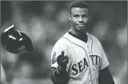  ?? AP/MARK DUNCAN, FILE ?? Seattle Mariners Ken Griffey Jr. tosses his batting helmet after grounding out in the eighth inning against the Cleveland Indians in an ALCS game on Oct. 13, 1995, in Cleveland. The Mariners are the only baseball franchise never to advance to the World Series.