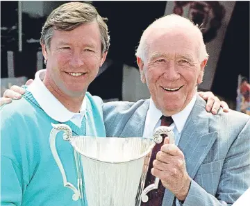  ??  ?? Scottish footballin­g knights, Sir Alex Ferguson and Sir Matt Busby.