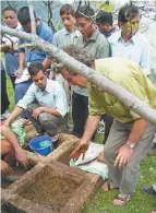  ??  ?? David Hogg leads a biodynamic Cow Pat Pit workshop in Uttarancha­l, India. Cow Pat Pit compound is especially prepared to include the influences of the yarrow, chamomile, nettle, oak bark, dandelion and valerian preparatio­ns that work with various...