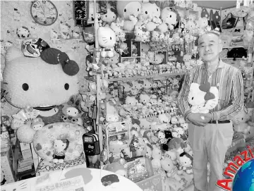  ??  ?? Masao owns the largest Hello Kitty collection in the world.