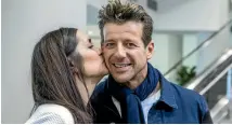  ?? PHOTO: FAIRFAX NZ ?? Simon Barnett with his wife Jodi at Christchur­ch Airport after he and dance partner Vanessa Cole won Dancing with the Stars.