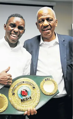  ?? Picture: SINO MAJANGAZA ?? OFF TO US: Boxer Xolisani ‘Nomeva’ Ndongeni with his backer Matthew Phosa
