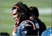  ?? CHARLES KRUPA/AP ?? QB Cam Newton admitted the Patriots offense was out of sync in his return.