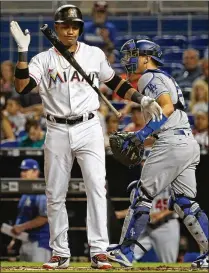  ?? DAVID SANTIAGO / MIAMI HERALD ?? Miami Marlins second baseman Starlin Castro after striking out to end the third inning Thursday against the Los Angeles Dodgers at Marlins Park.